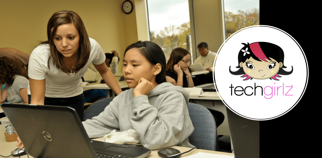 A volunteer helps a middle school girl at a TechGirlz workshop