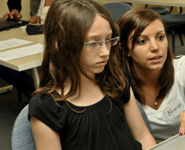 A student and volunteer work together at a TechGirlz workshop